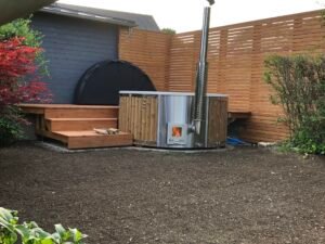 Integrert vedfyrt ovn for badestamp – 30 kW i 316 rustfritt stål