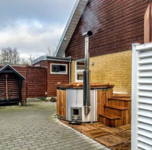 Integrert vedfyrt ovn for badestamp – 30 kW i 316 rustfritt stål